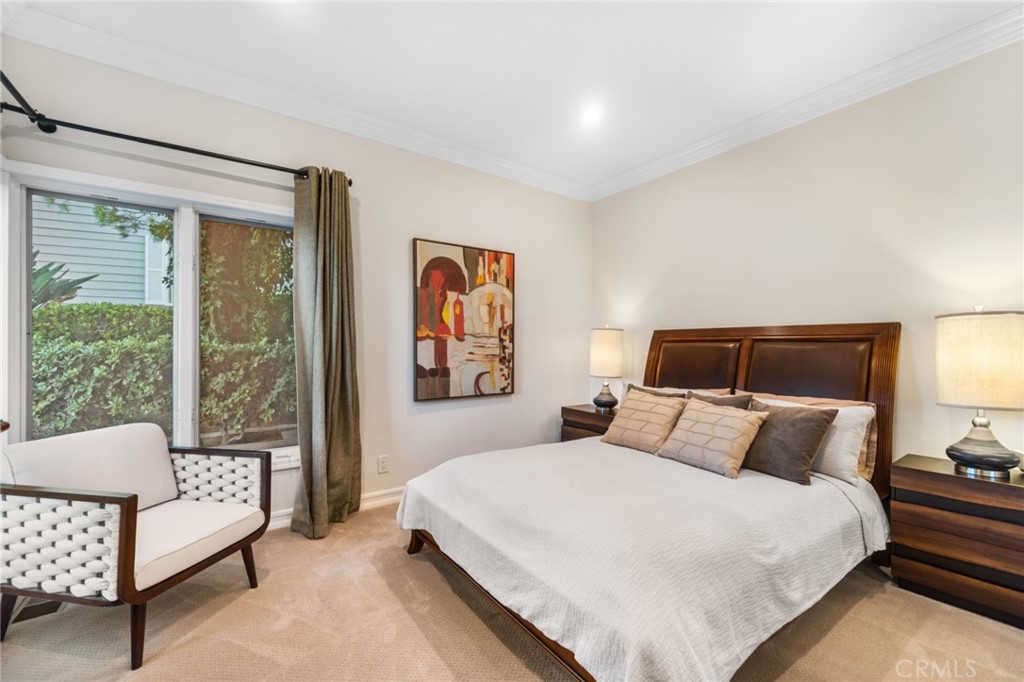 81 Marbella San Clemente, CA 92673 - Photo 18 of 65 a bedroom with a bed and a couch