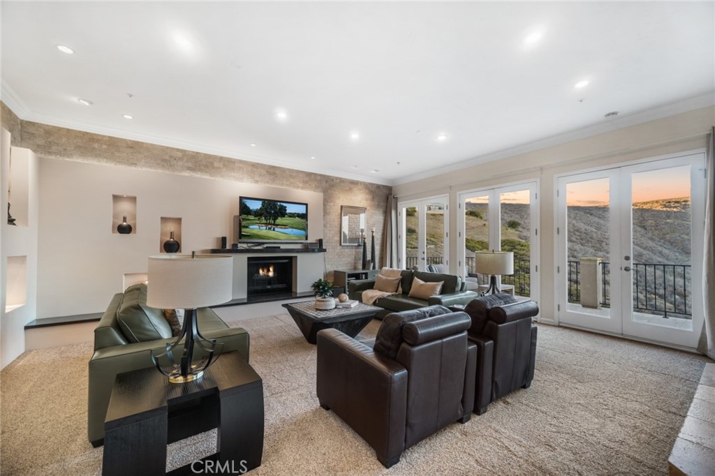 81 Marbella San Clemente, CA 92673 - Photo 2 of 65 a living room with furniture floor to ceiling window and wooden floor