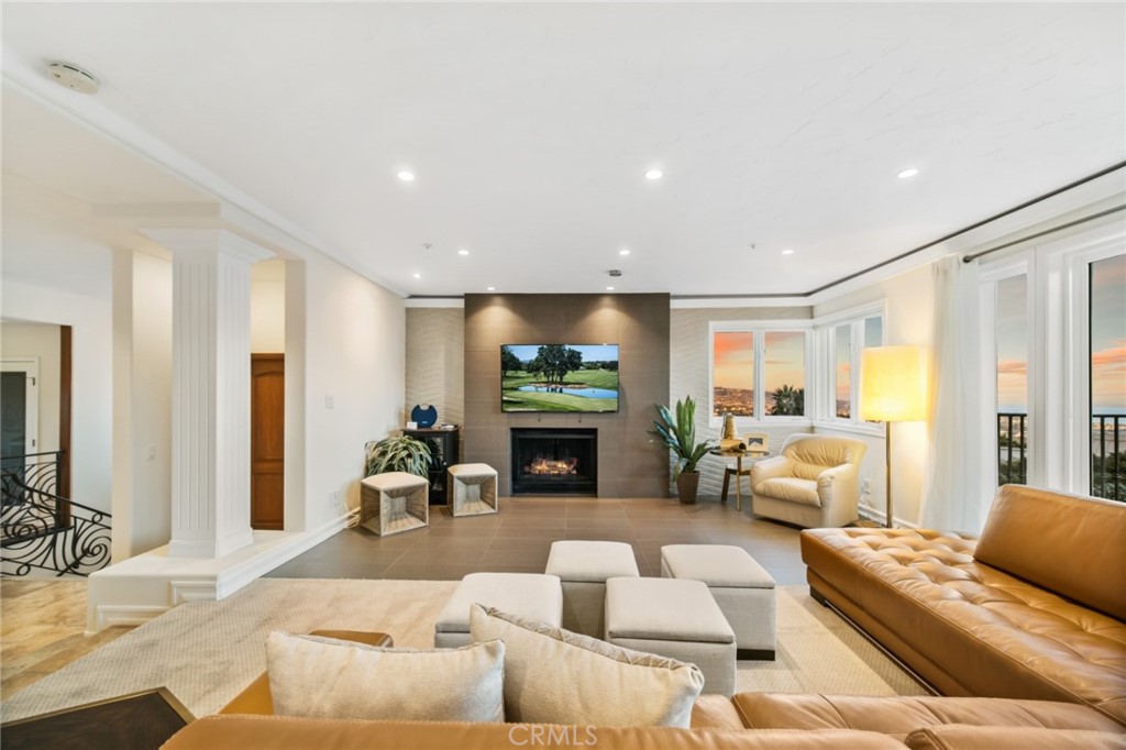 81 Marbella San Clemente, CA 92673 - Photo 32 of 65 a living room with furniture and a large window
