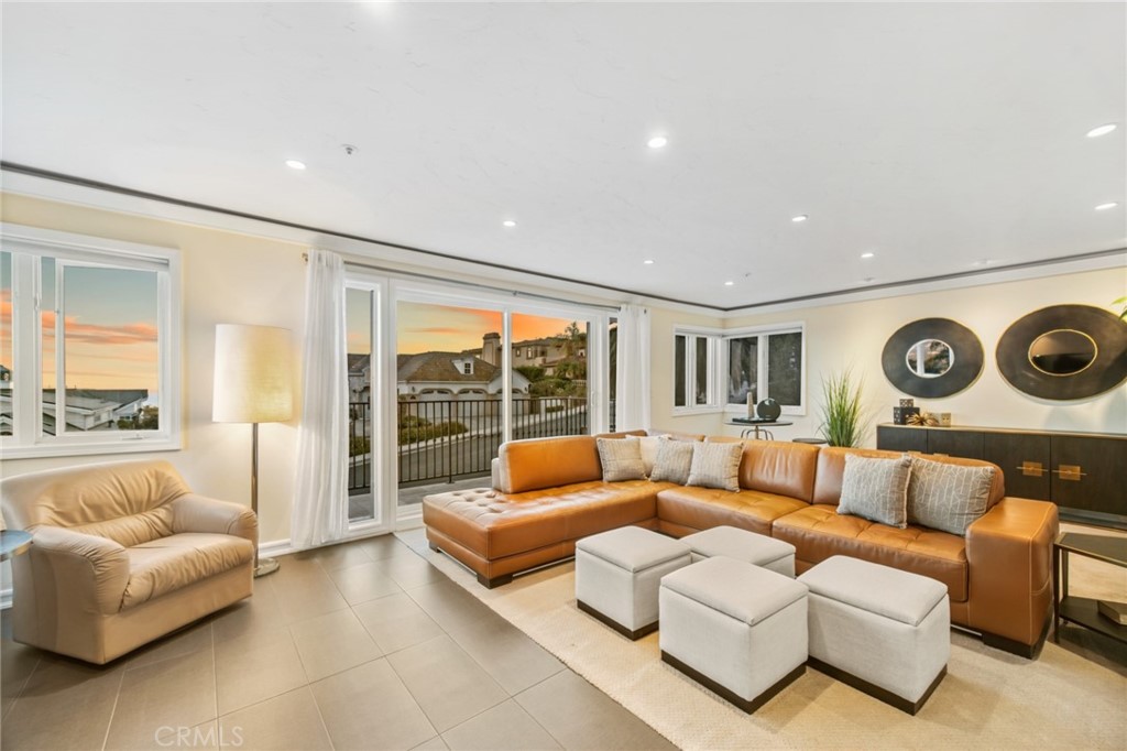 81 Marbella San Clemente, CA 92673 - Photo 33 of 65 a living room with furniture and a large window