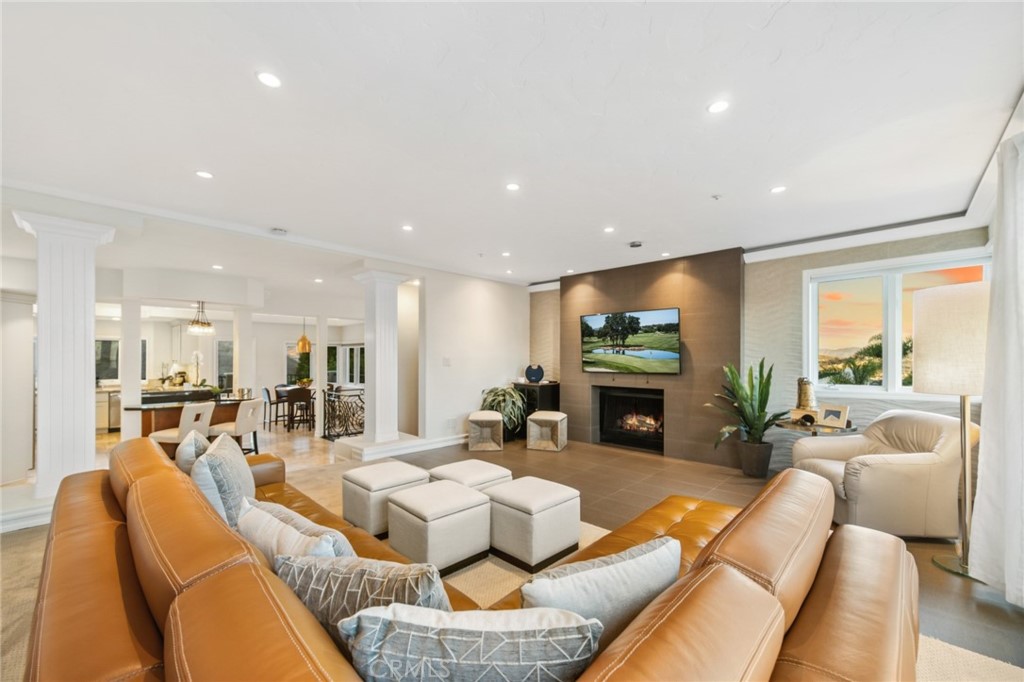 81 Marbella San Clemente, CA 92673 - Photo 65 of 65 a living room with furniture and a flat screen tv