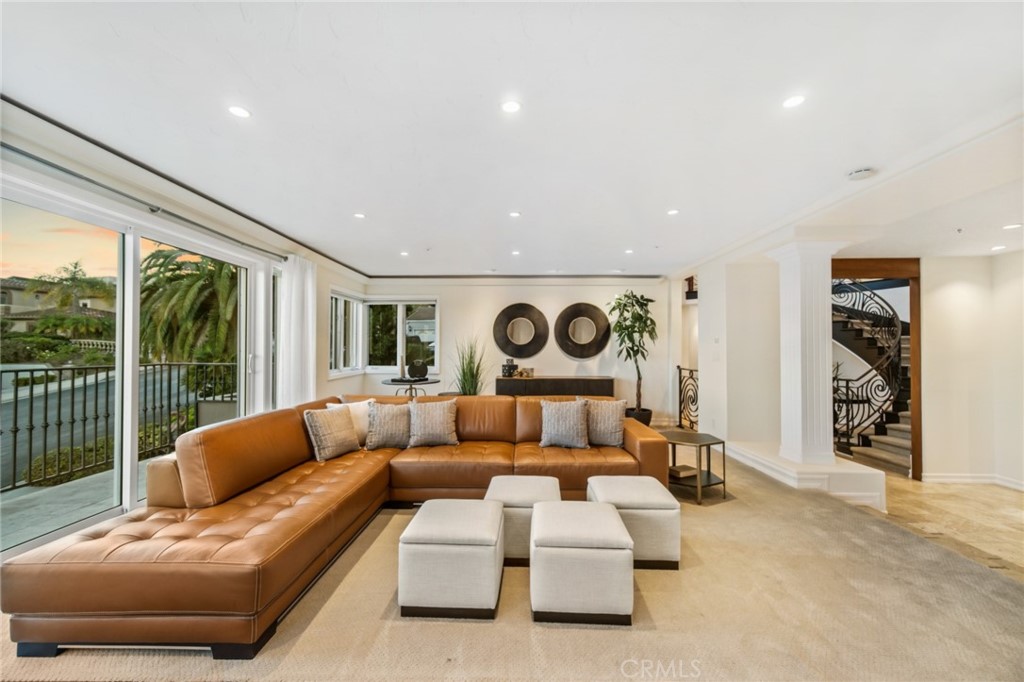 81 Marbella San Clemente, CA 92673 - Photo 35 of 65 a living room with furniture and a large window