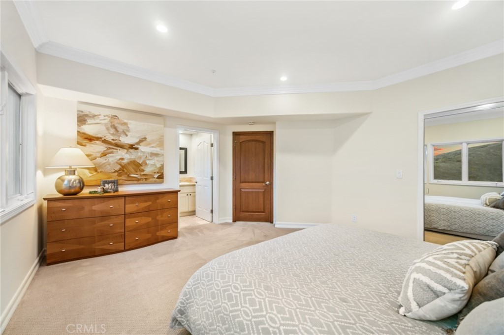 81 Marbella San Clemente, CA 92673 - Photo 45 of 65 a bedroom with a bed and a window