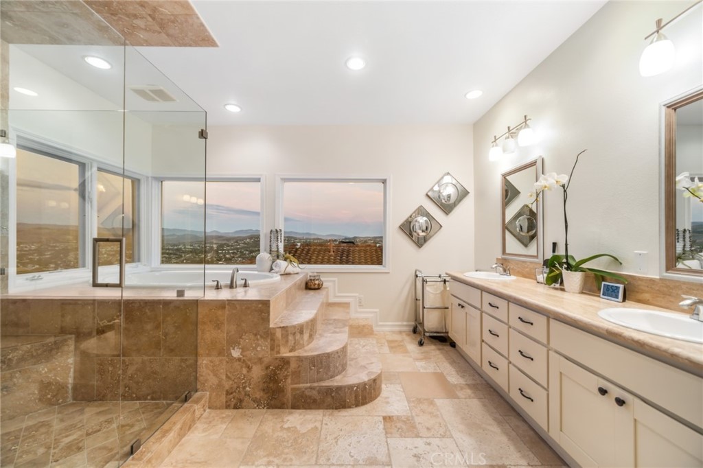 81 Marbella San Clemente, CA 92673 - Photo 5 of 65 a large bathroom with a large tub and sink