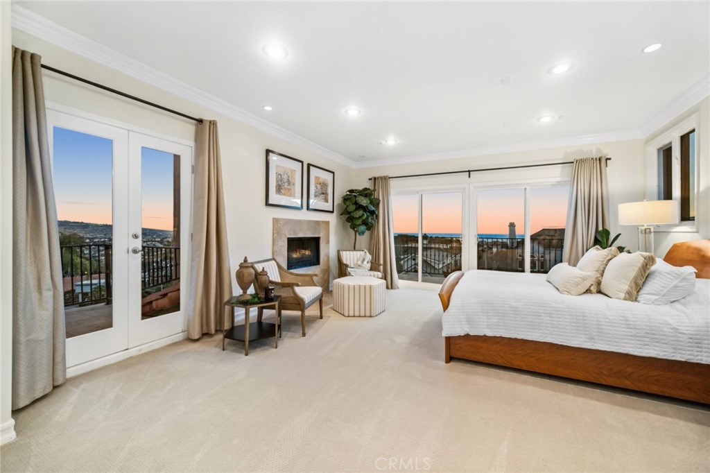 81 Marbella San Clemente, CA 92673 - Photo 52 of 65 a bed room with a bed and a large window