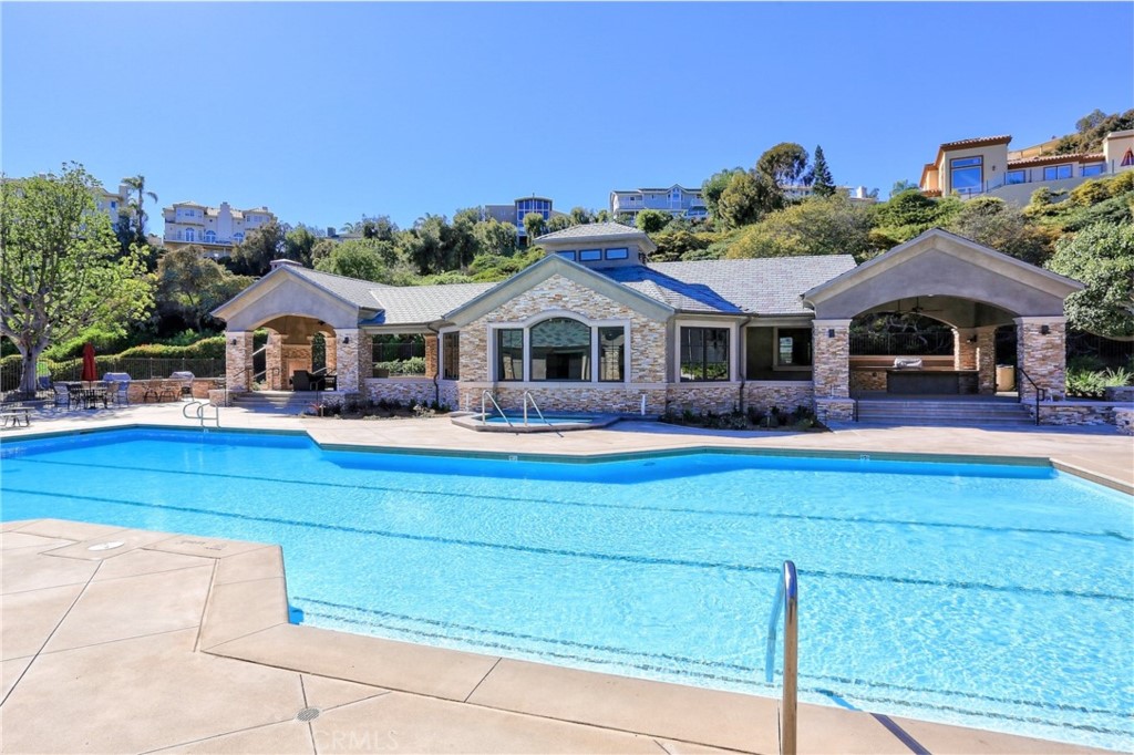 81 Marbella San Clemente, CA 92673 - Photo 62 of 65 a front view of a building with street view