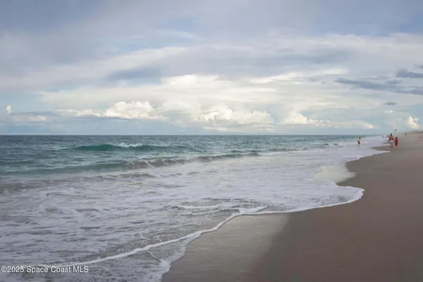 a view of beach and ocean