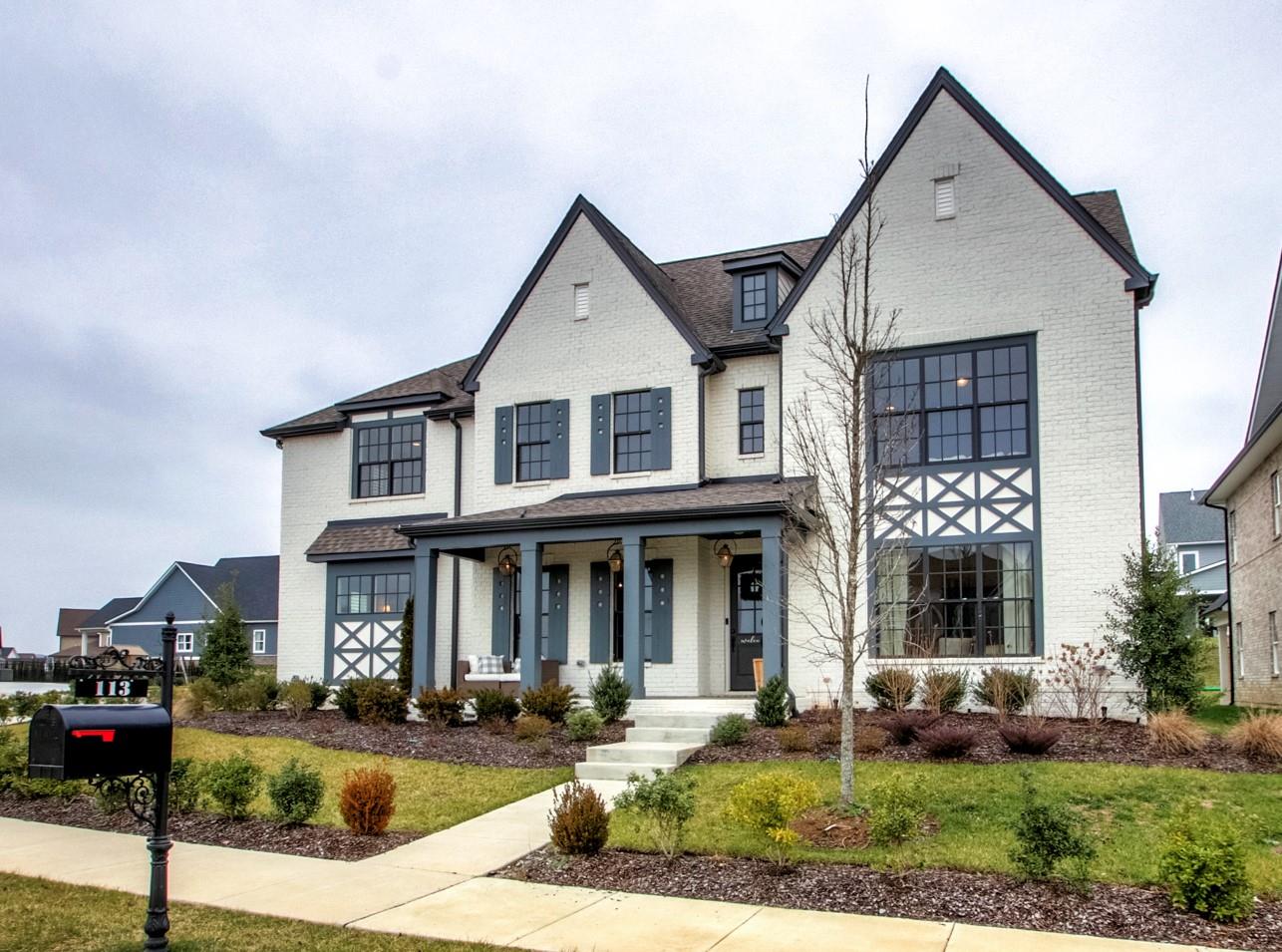 113 Vanner Road Mount Juliet, TN 37122 - Photo 1 of 30 a front view of a house with garden