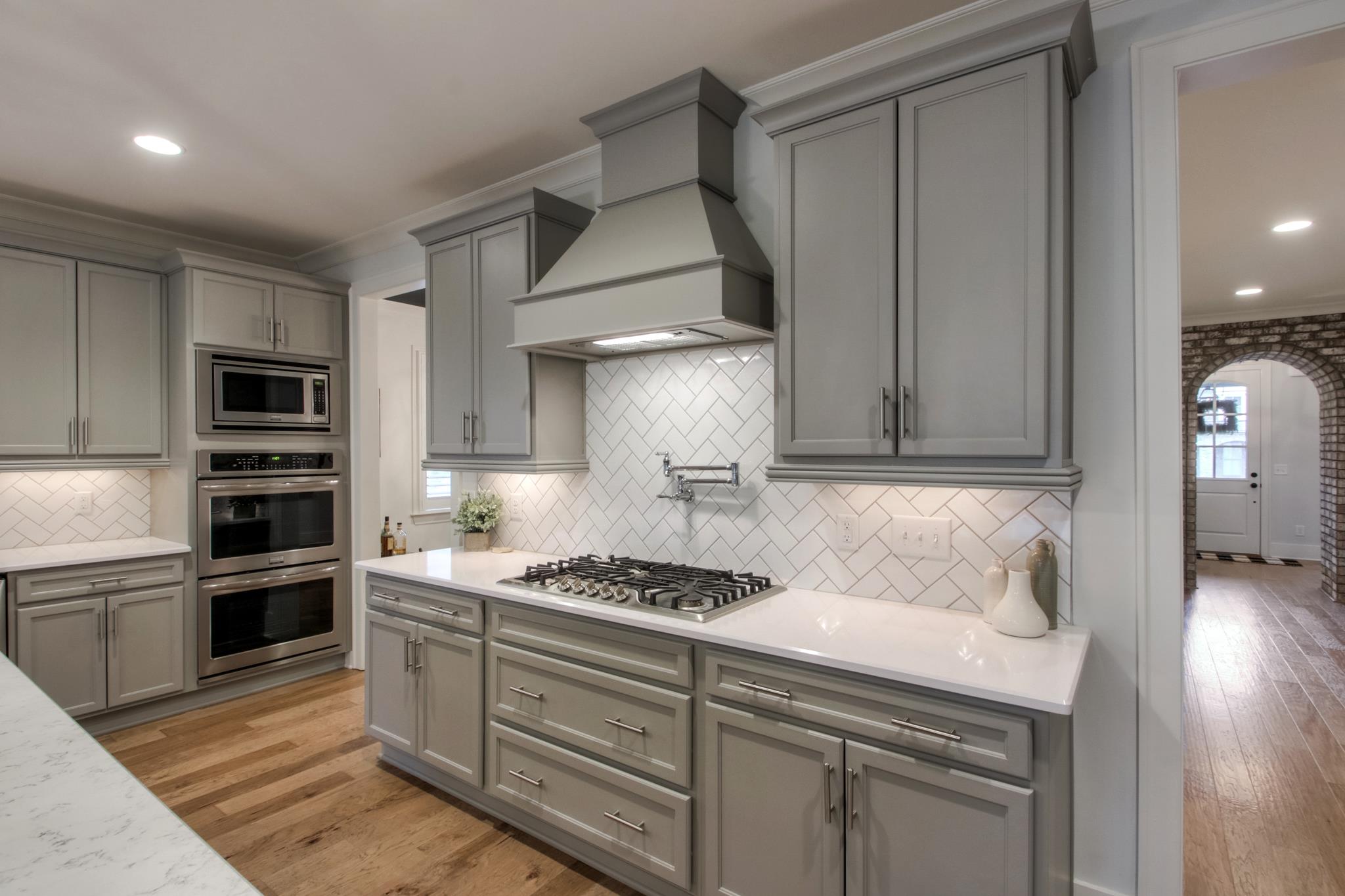 113 Vanner Road Mount Juliet, TN 37122 - Photo 12 of 30 a kitchen with stainless steel appliances granite countertop a sink stove and refrigerator