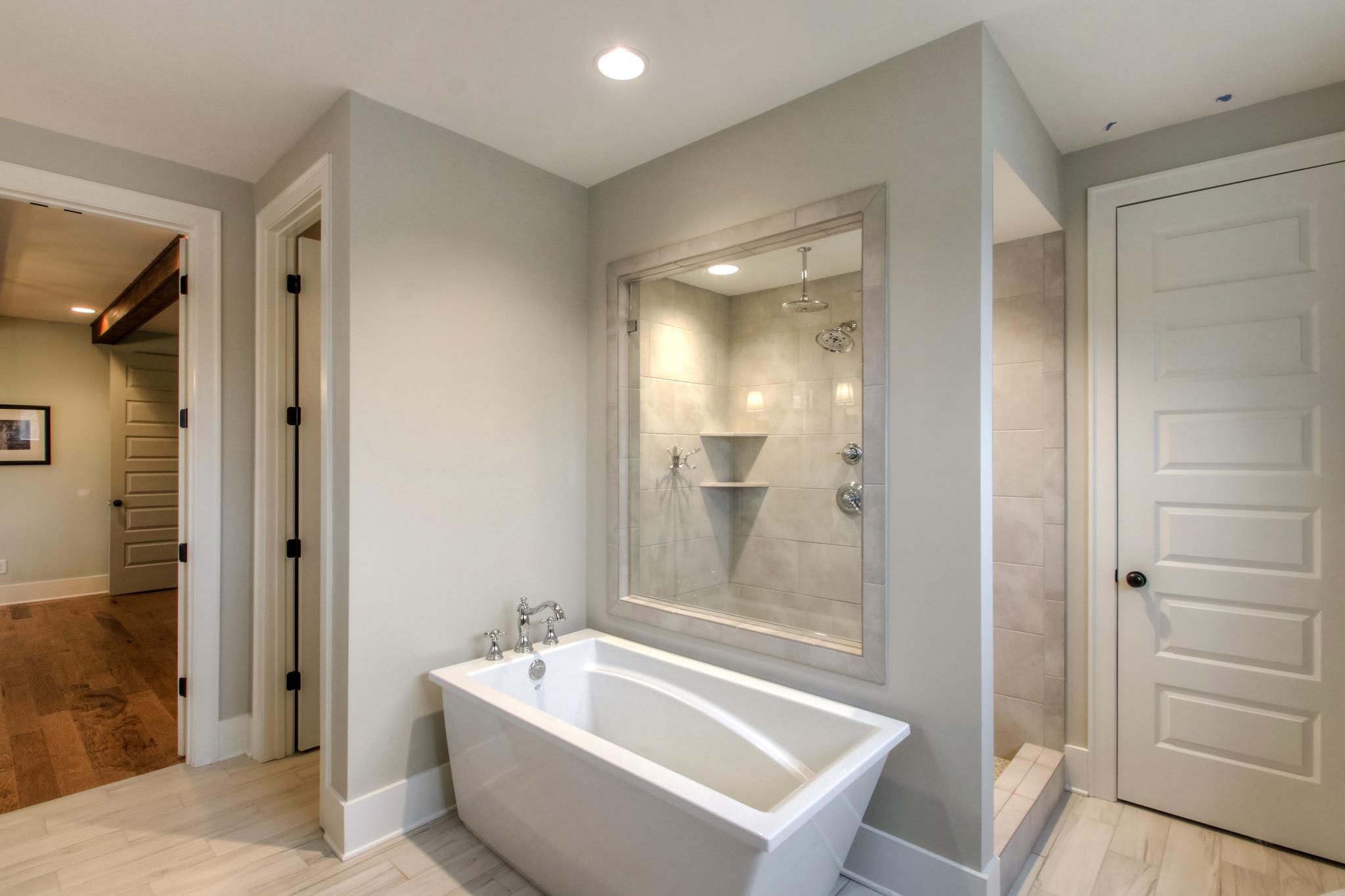 113 Vanner Road Mount Juliet, TN 37122 - Photo 18 of 30 a spacious bathroom with a bathtub and shower