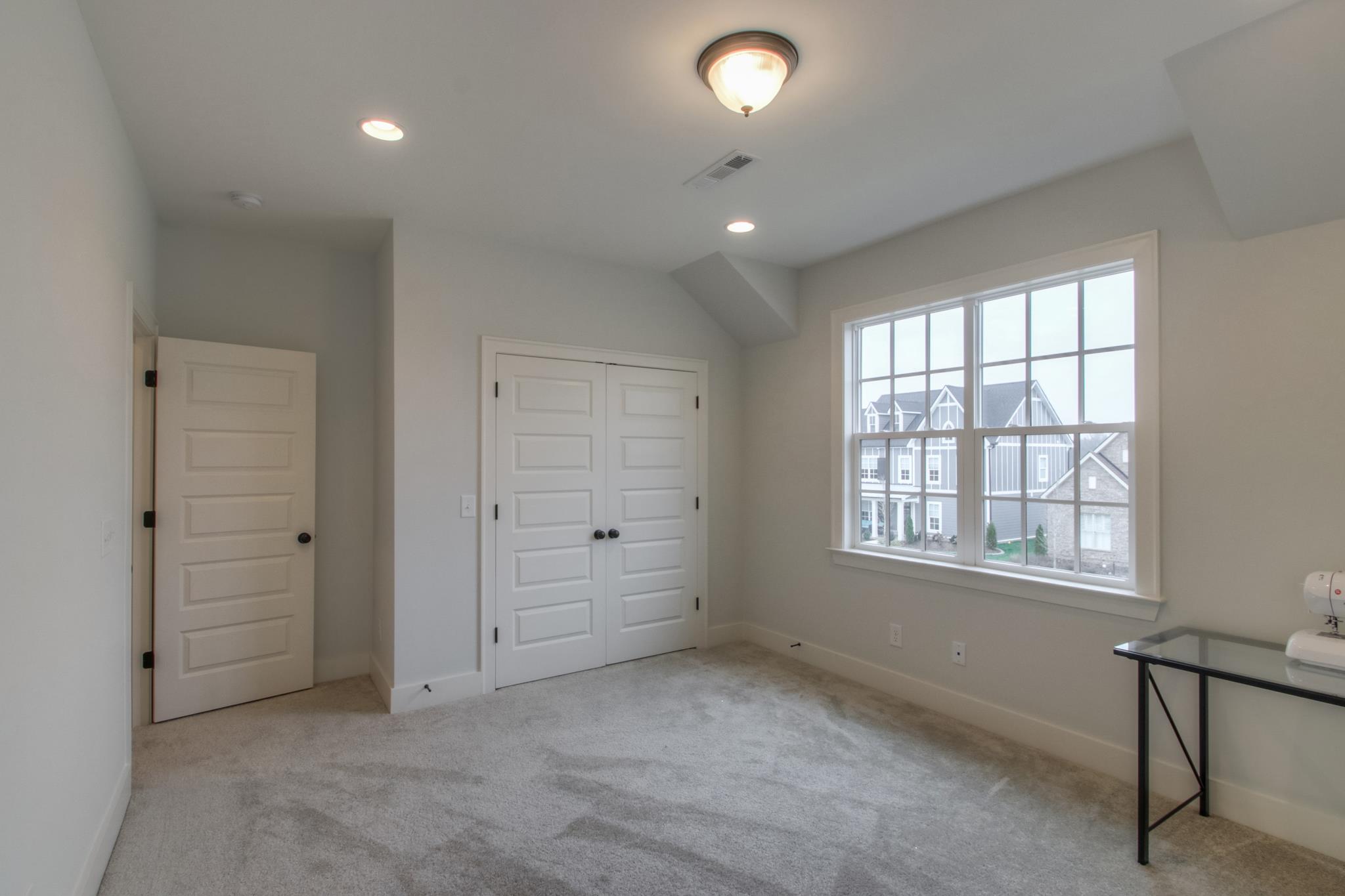 113 Vanner Road Mount Juliet, TN 37122 - Photo 23 of 30 an empty room with windows and closet