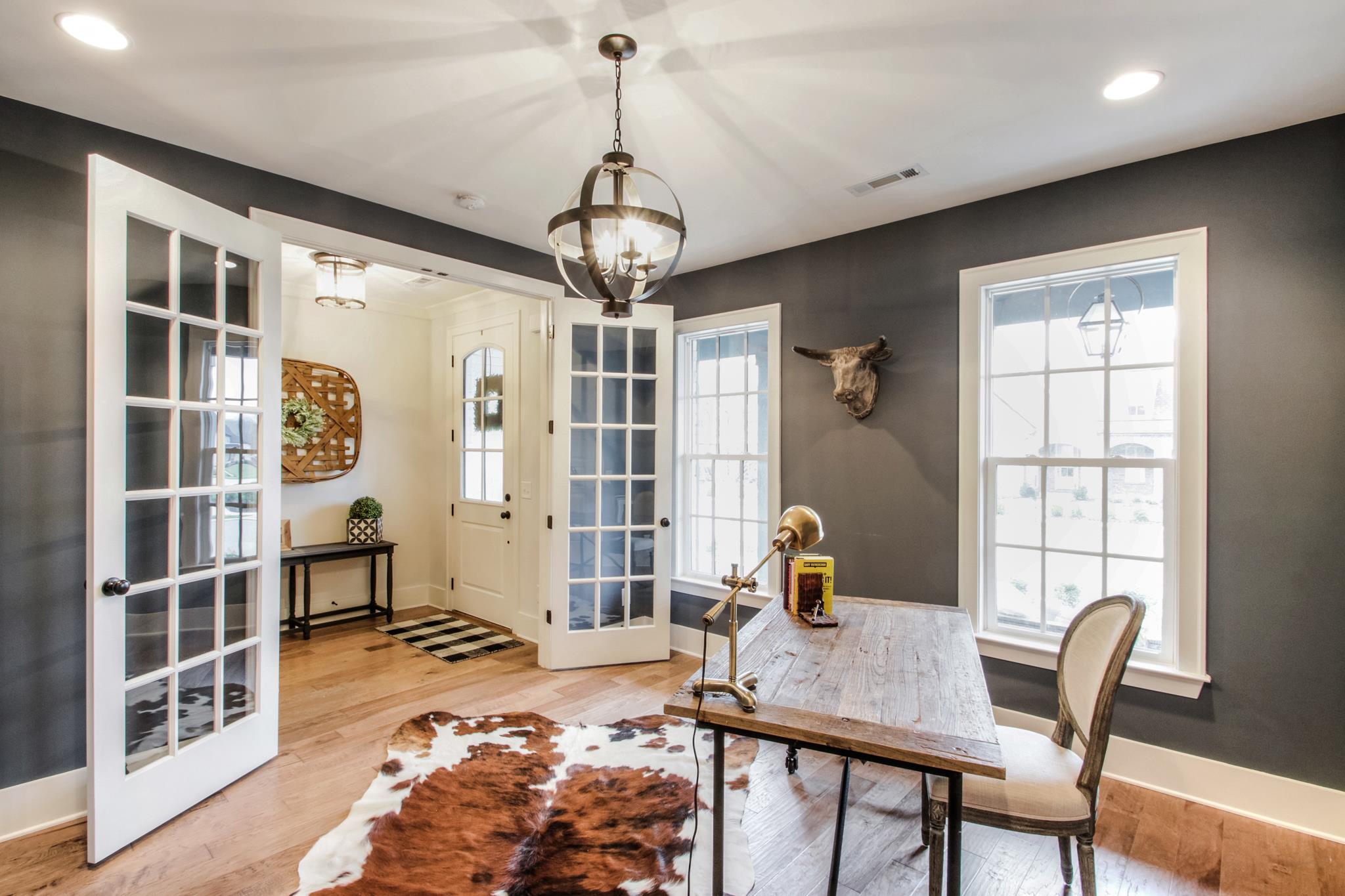 113 Vanner Road Mount Juliet, TN 37122 - Photo 4 of 30 a view of a dining room with furniture window and wooden floor