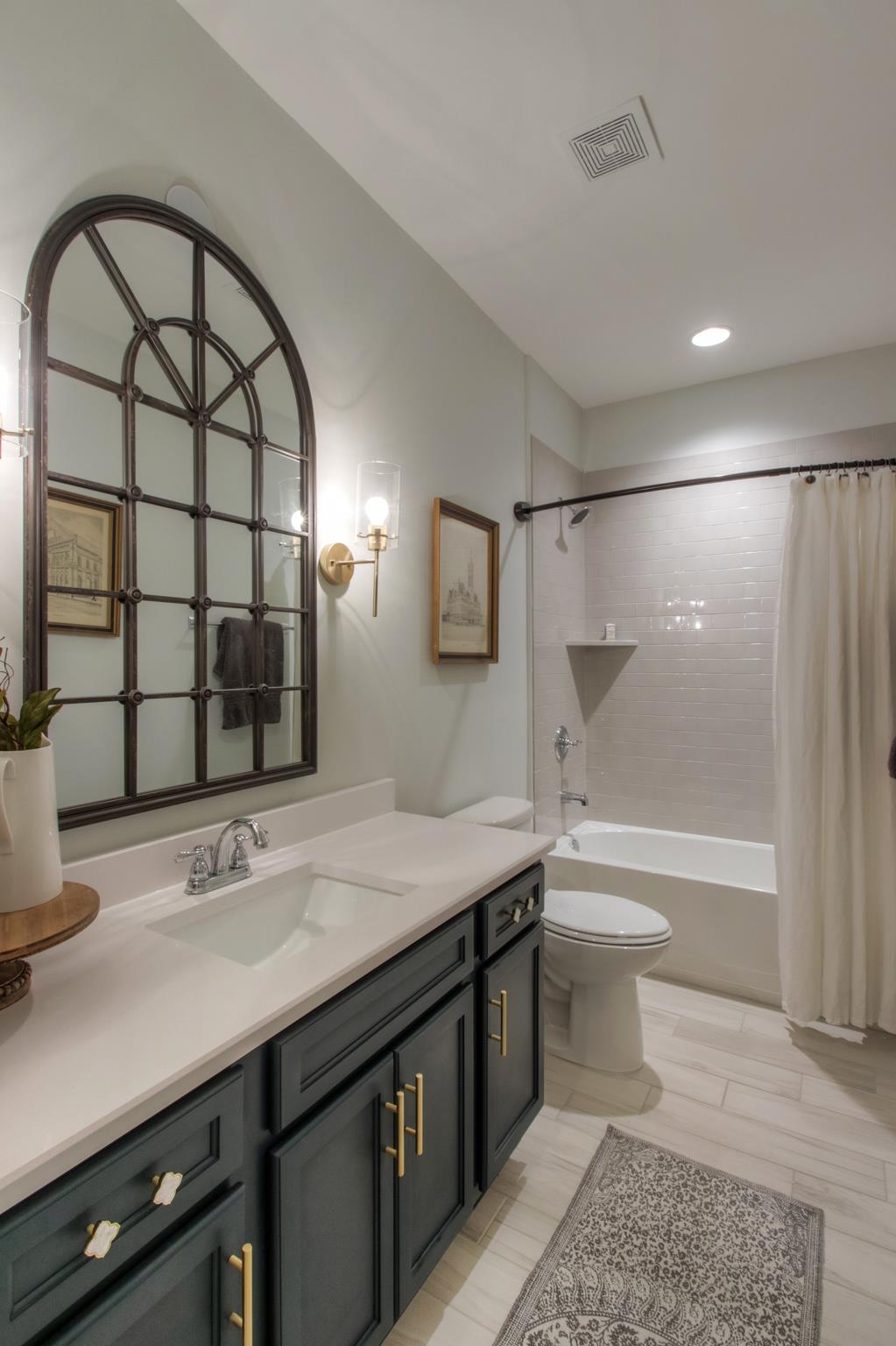 113 Vanner Road Mount Juliet, TN 37122 - Photo 8 of 30 a bathroom with a sink a toilet and shower