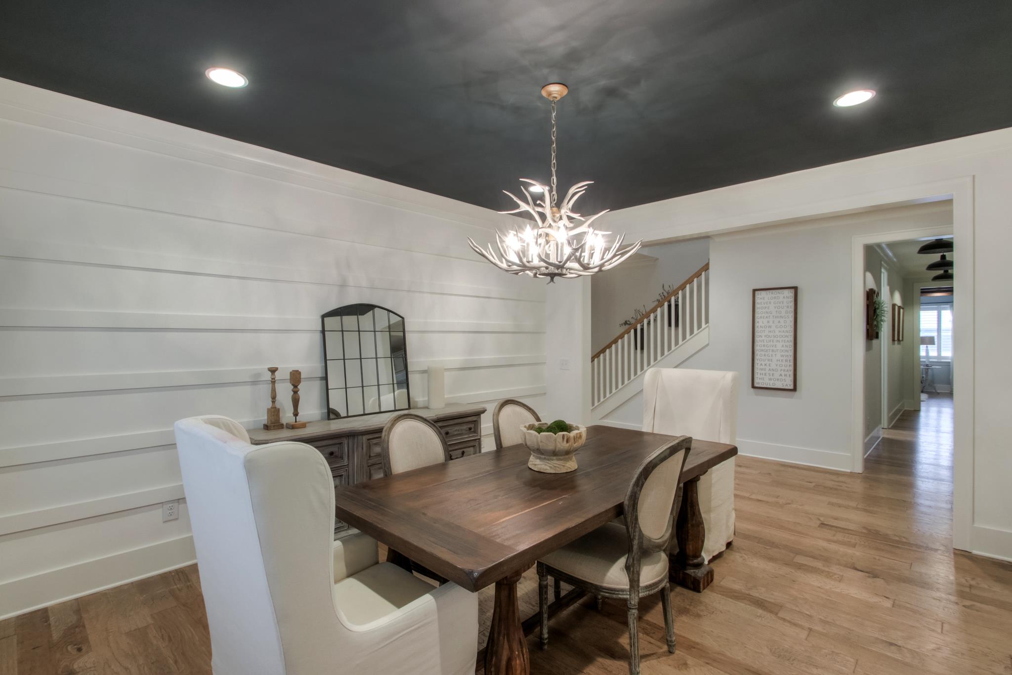 113 Vanner Road Mount Juliet, TN 37122 - Photo 9 of 30 a view of a dining room with furniture and chandelier