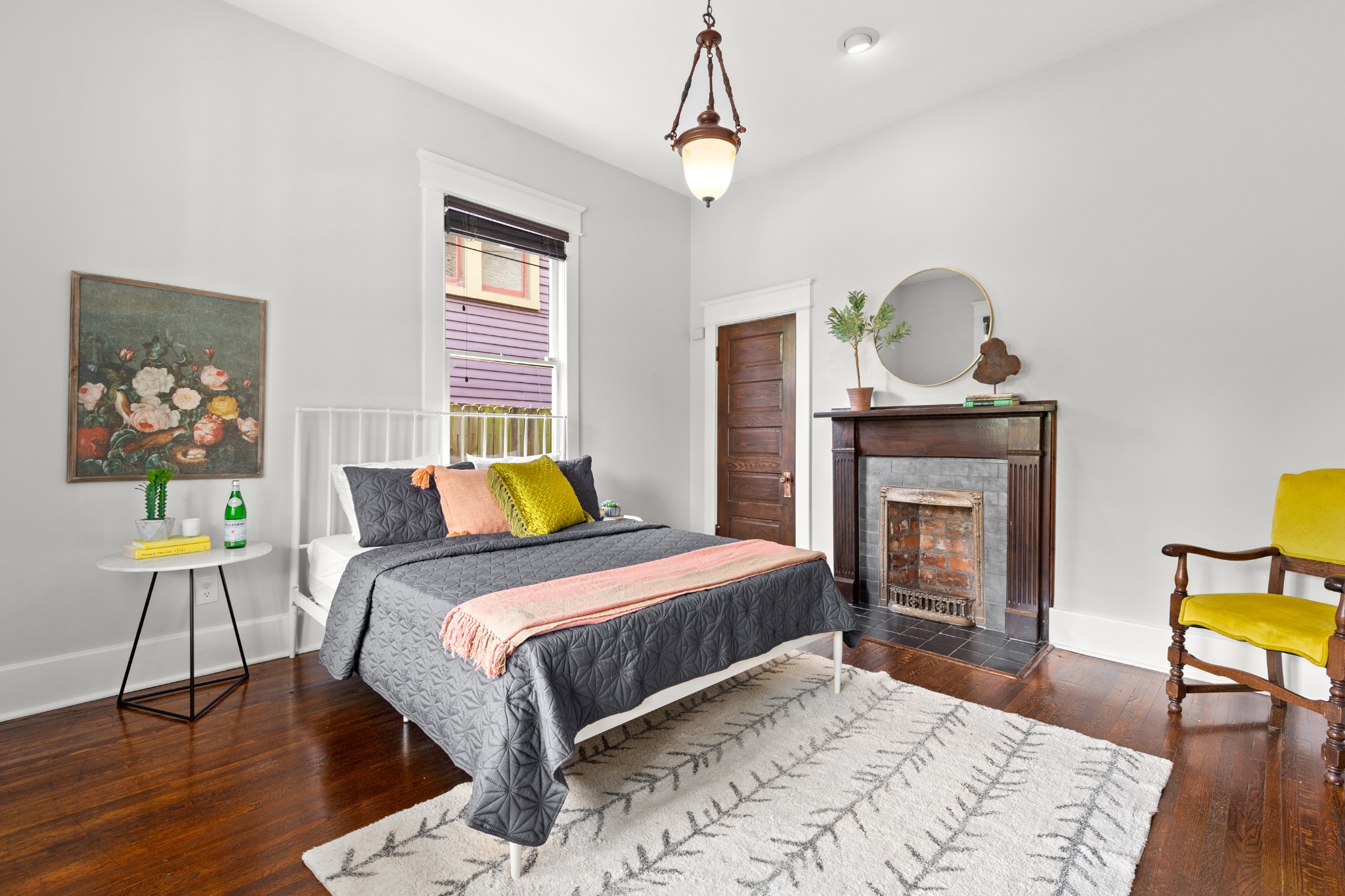 912 South Douglas Avenue Nashville, TN 37204 - Photo 17 of 34 a bedroom with a bed and a fireplace