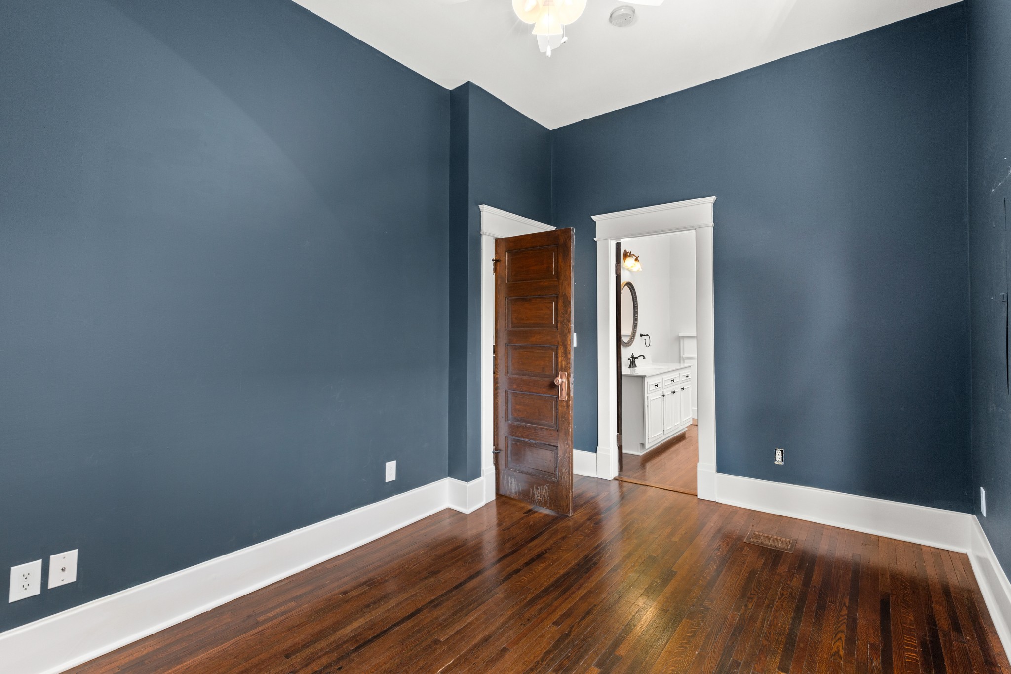 912 South Douglas Avenue Nashville, TN 37204 - Photo 18 of 34 a view of an empty room with wooden floor