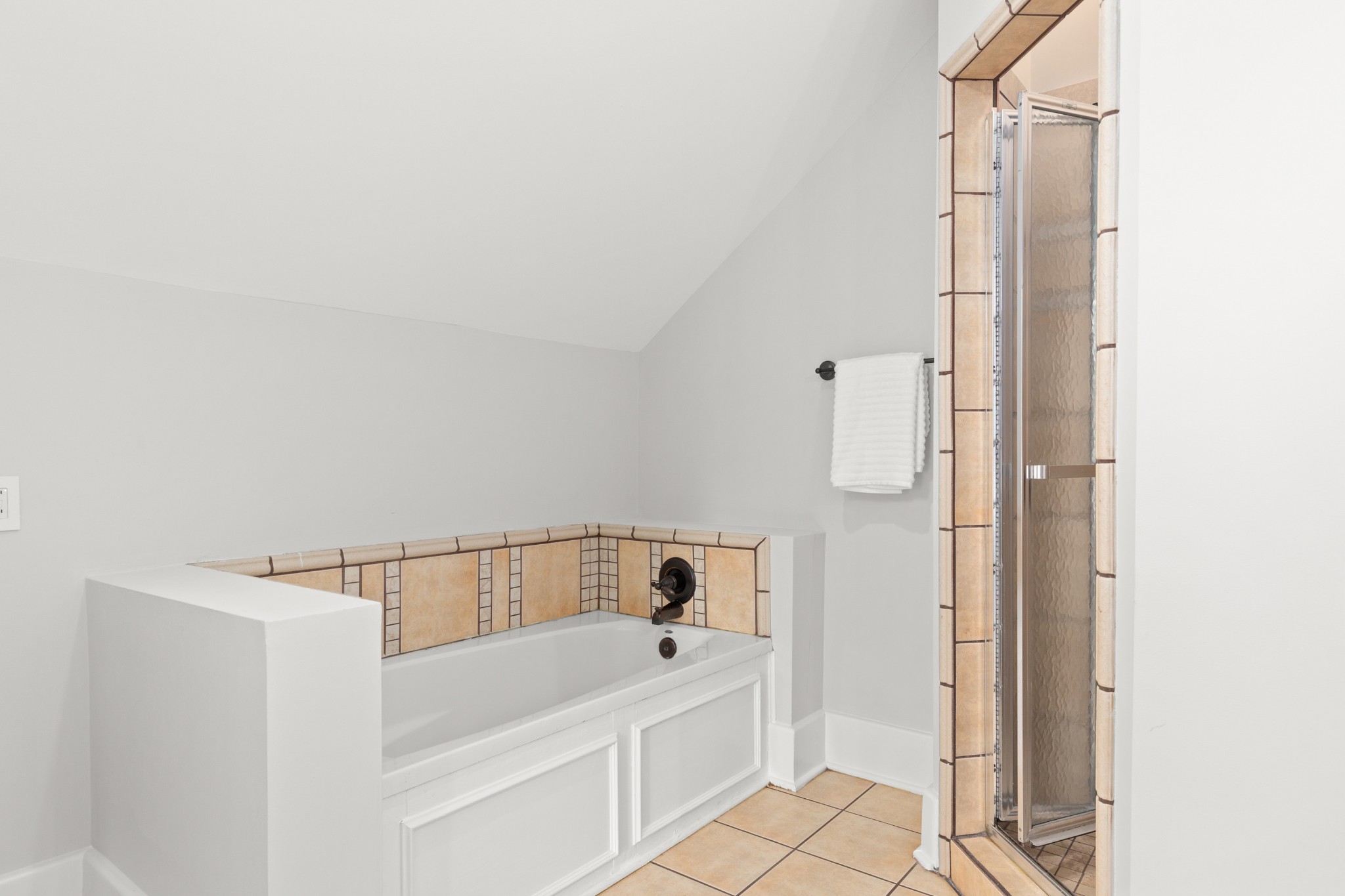 912 South Douglas Avenue Nashville, TN 37204 - Photo 25 of 34 a bathroom with a bathtub and a shower