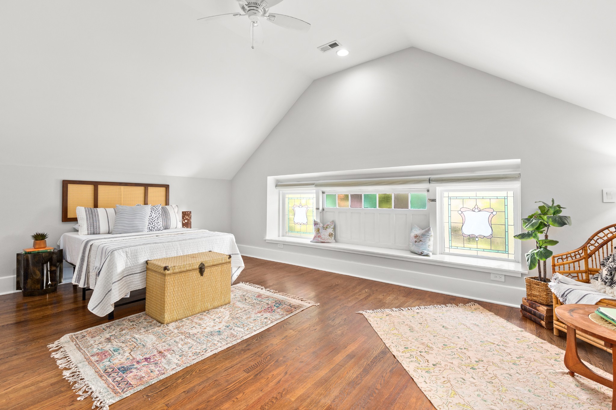 912 South Douglas Avenue Nashville, TN 37204 - Photo 27 of 34 a living room with a couch and a dresser next to a window