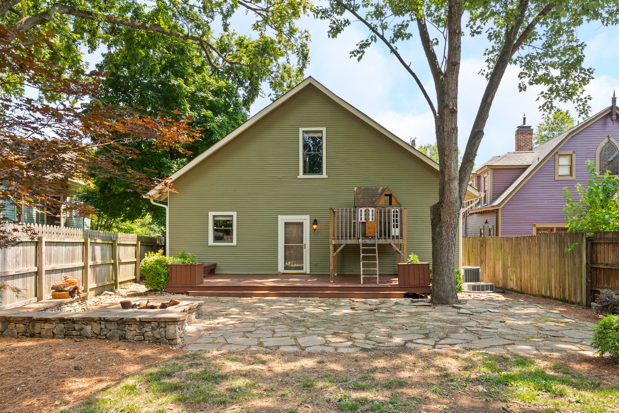 912 South Douglas Avenue Nashville, TN 37204 - Photo 32 of 34 a view of a house with a yard and large tree