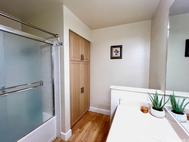 a view of a hallway with potted plant