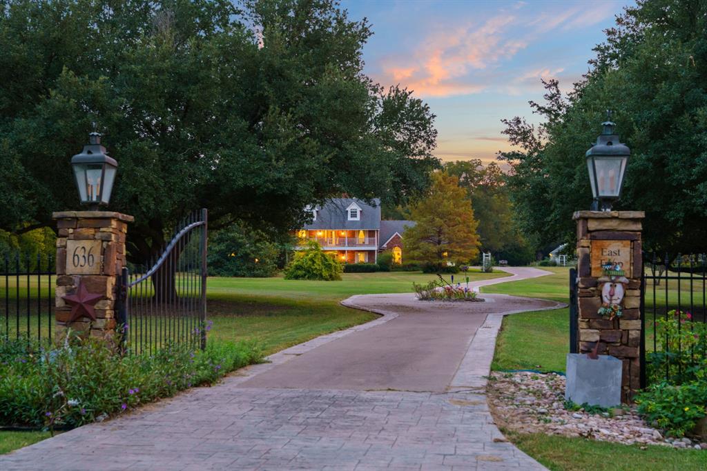 636 East Tripp Road Sunnyvale, TX 75182 - Photo 2 of 40 a front view of a house with garden