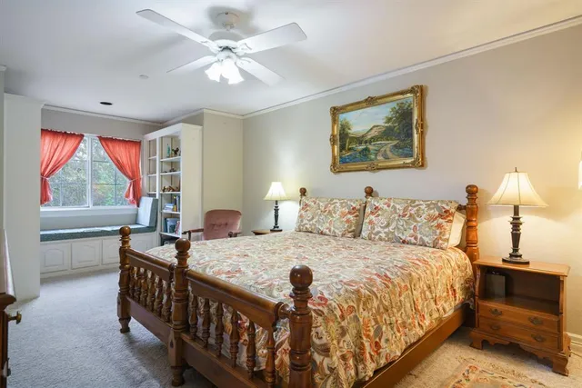 a bedroom with a bed and a walk in closet