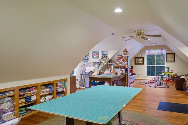 a view of a patio with a dining table and chairs