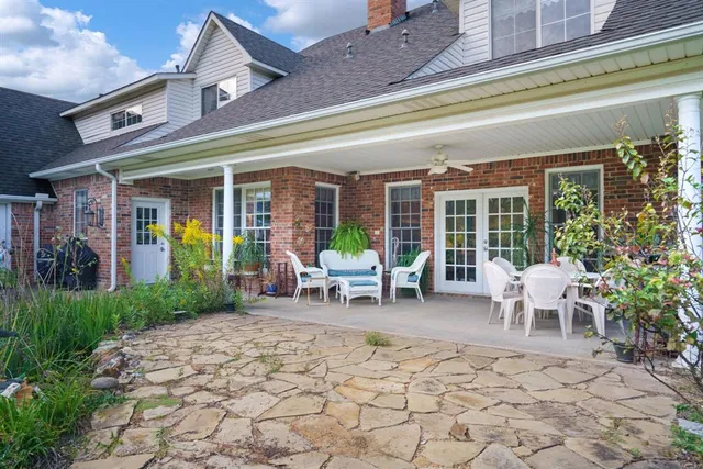 a backyard of a house with lots of green space
