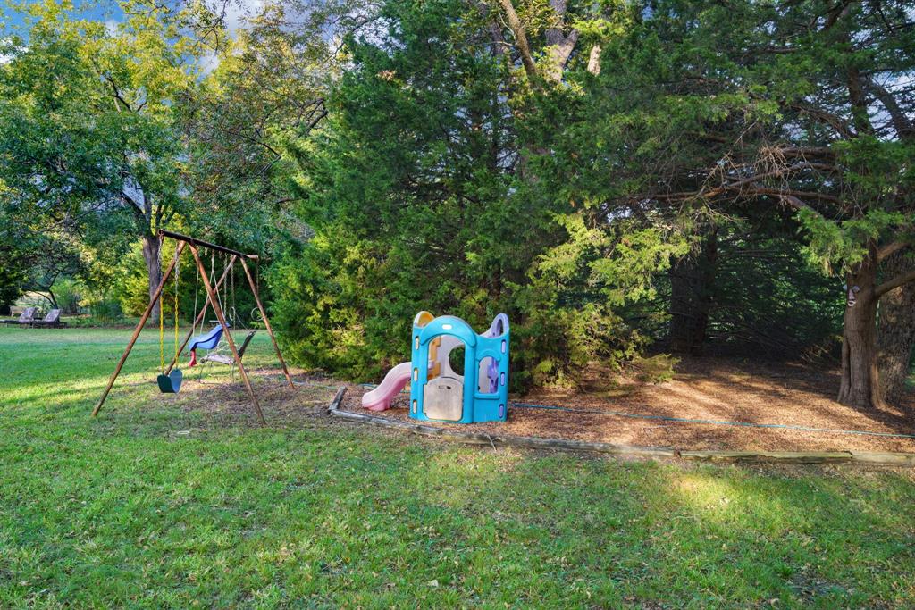 636 East Tripp Road Sunnyvale, TX 75182 - Photo 32 of 40 a view of a park with slide