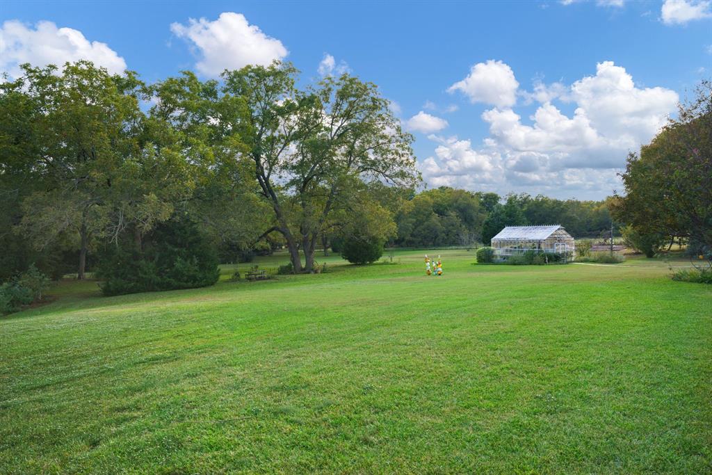 636 East Tripp Road Sunnyvale, TX 75182 - Photo 35 of 40 a backyard of a house with lots of green space