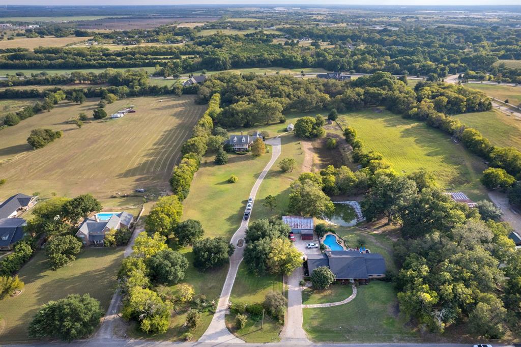 636 East Tripp Road Sunnyvale, TX 75182 - Photo 39 of 40 an aerial view of residential houses with outdoor space and lake view