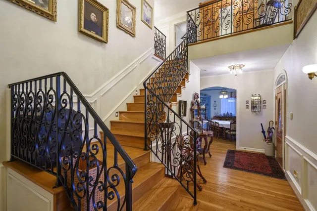 a view of entryway with wooden floor