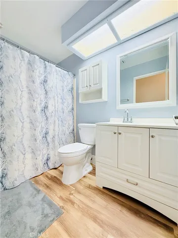 a bathroom with a sink a toilet and a bathtub