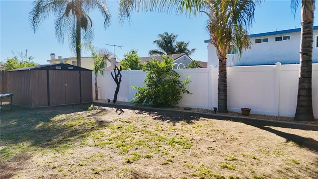 a view of a house with basketball court