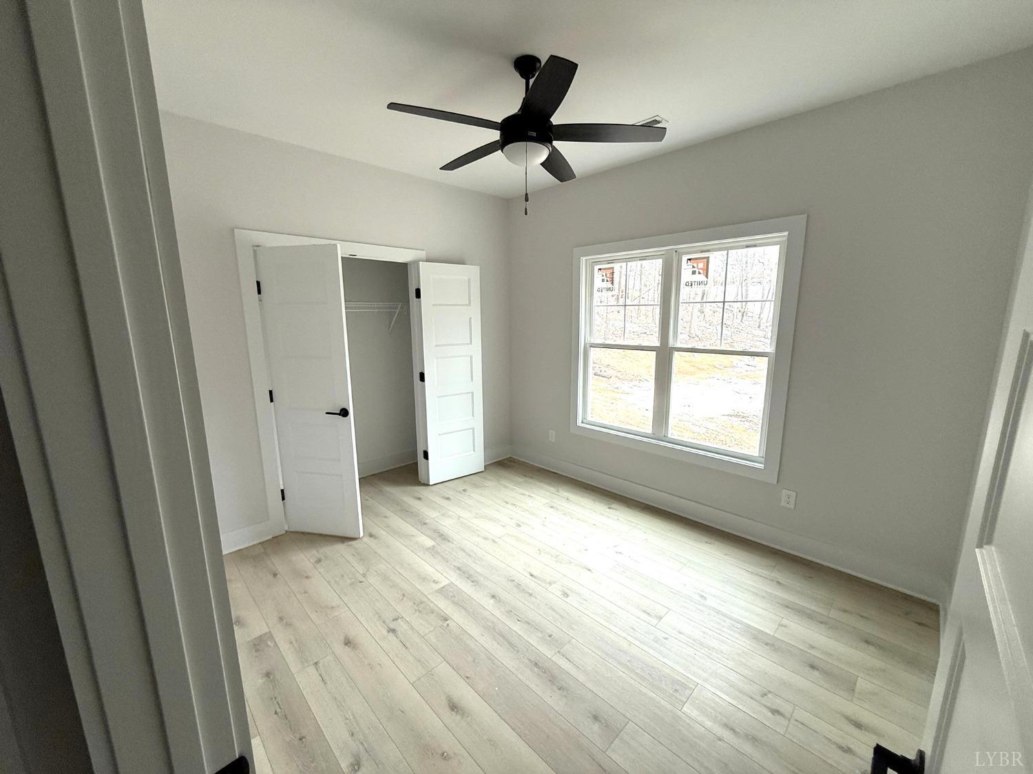 13790 Leesville Road Evington, VA 24550 - Photo 15 of 28 a view of an empty room with a window