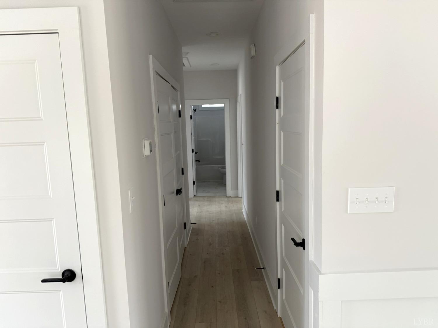13790 Leesville Road Evington, VA 24550 - Photo 18 of 28 a view of a hallway with a white walls