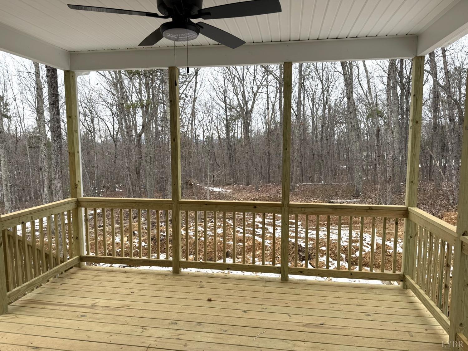 13790 Leesville Road Evington, VA 24550 - Photo 23 of 28 a view of wooden balcony with a floor to ceiling window and wooden floor