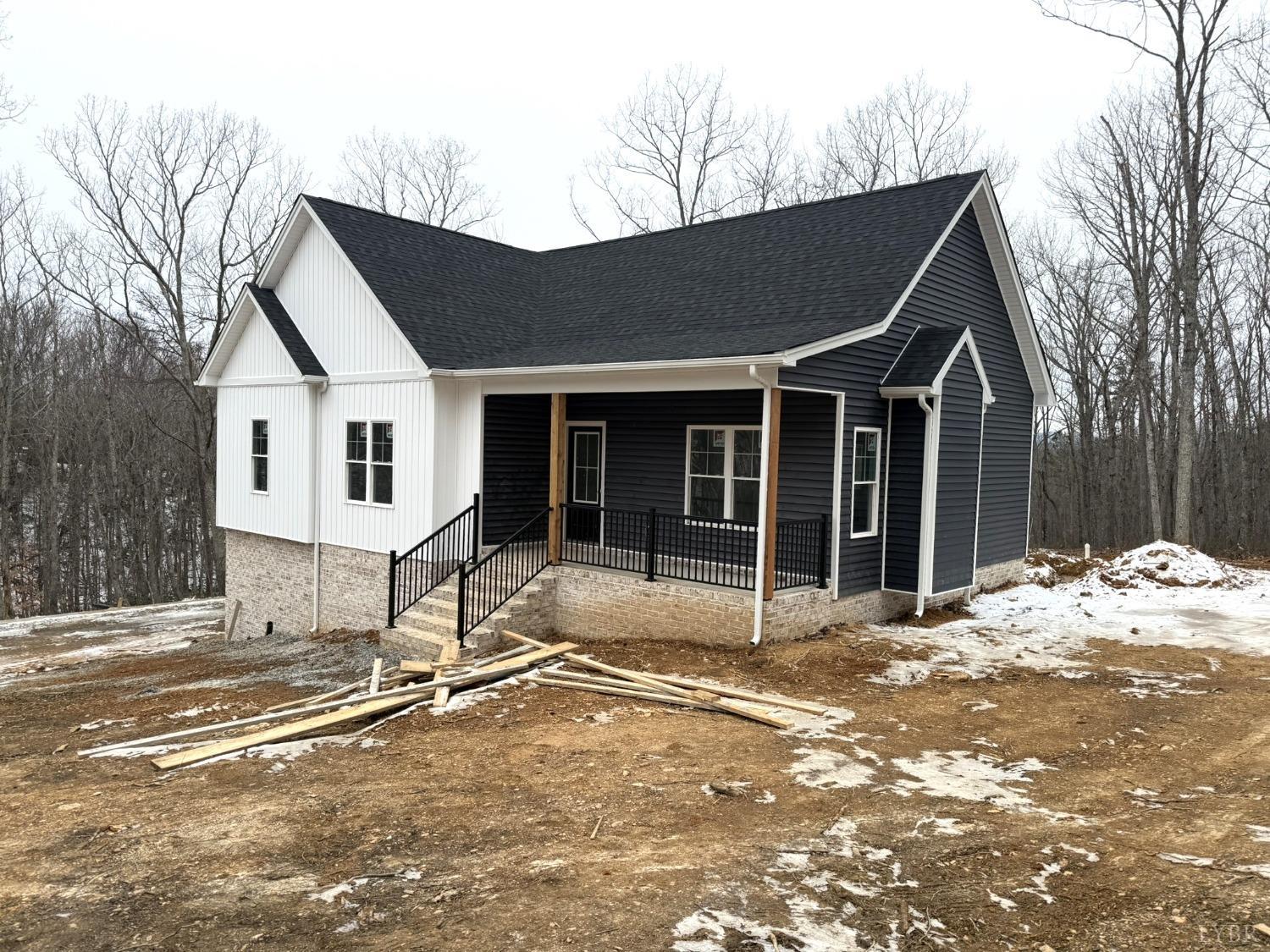 13790 Leesville Road Evington, VA 24550 - Photo 3 of 28 a view of a house with snow on the side of the road