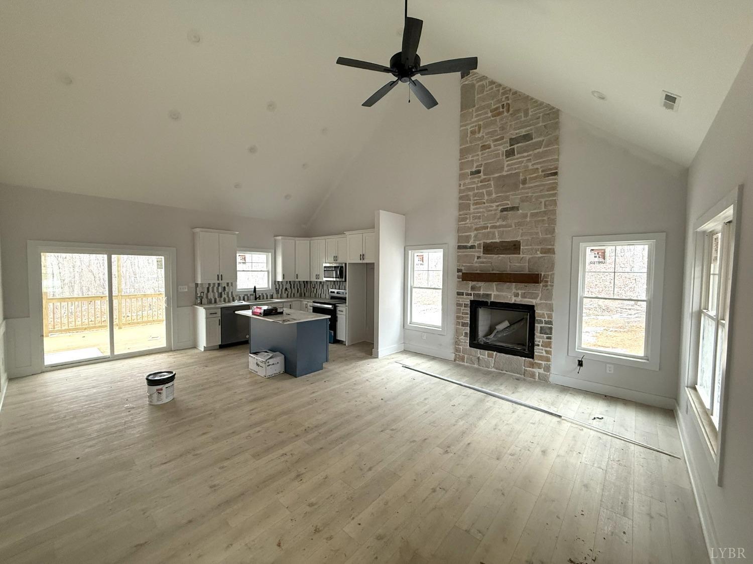 13790 Leesville Road Evington, VA 24550 - Photo 4 of 28 an entryway and livingroom with fireplace