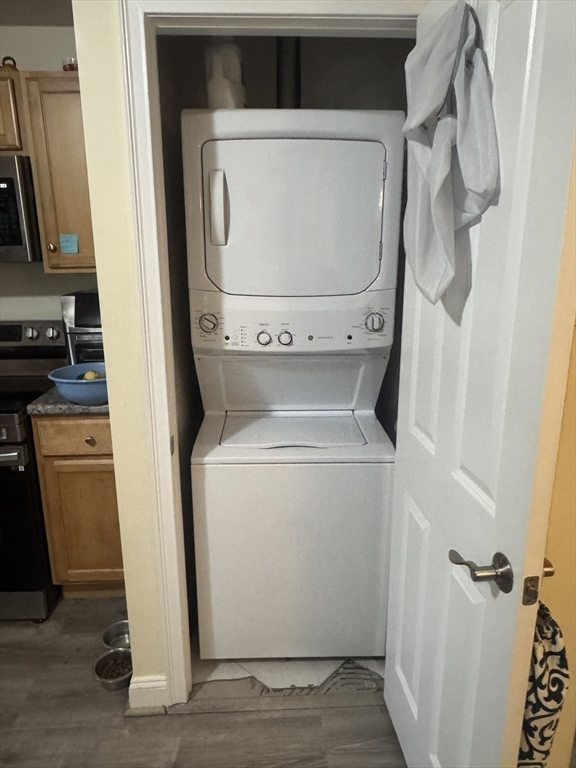 89 Main Street Rowley, MA 01969 - Photo 13 of 39 a utility room with dryer and washer