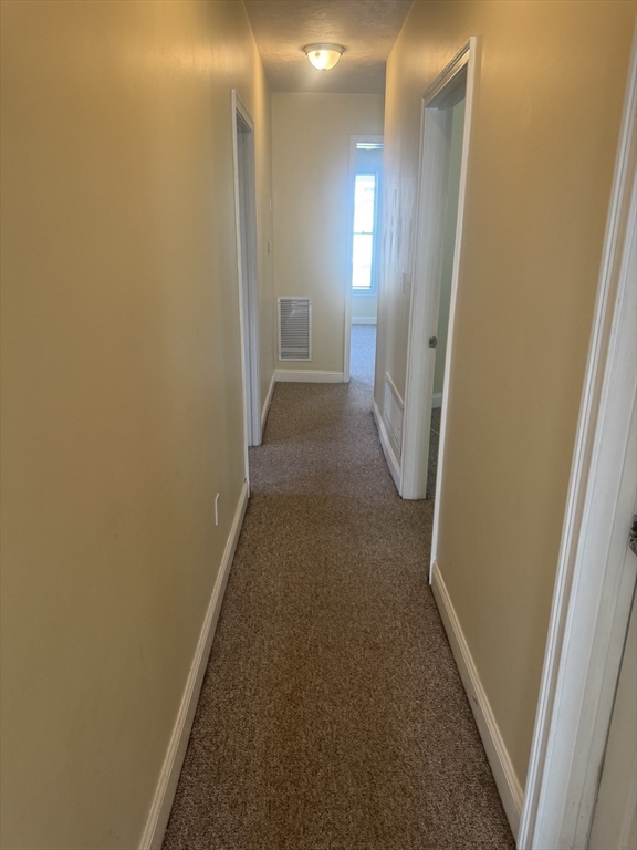 89 Main Street Rowley, MA 01969 - Photo 28 of 39 a view of a hallway