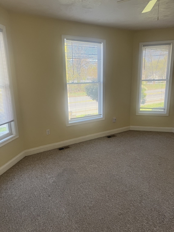 89 Main Street Rowley, MA 01969 - Photo 30 of 39 an empty room with a window