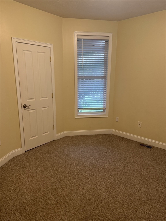 89 Main Street Rowley, MA 01969 - Photo 33 of 39 an empty room with a window