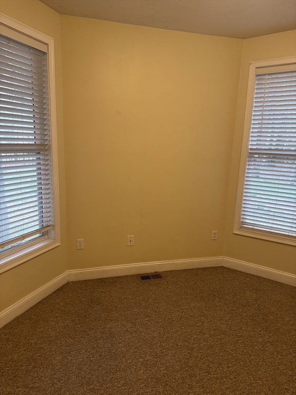 89 Main Street Rowley, MA 01969 - Photo 34 of 39 an empty room with a window