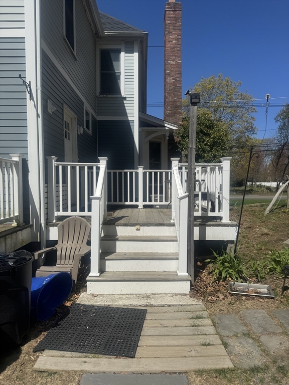 89 Main Street Rowley, MA 01969 - Photo 6 of 39 a view of fountain in the back yard of the house