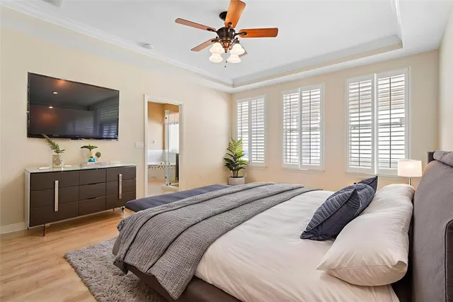 a view of a dinning room with a table and chairs