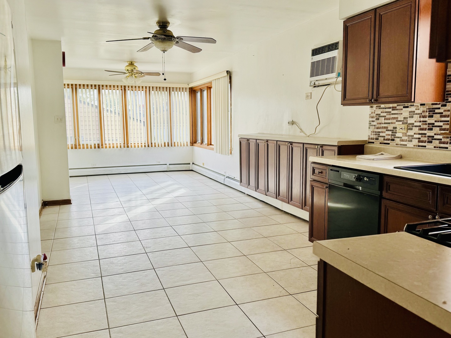 4211 West 63rd Street, Unit 1 Chicago, IL 60629 - Photo 7 of 13 a view of a kitchen with a sink and cabinets