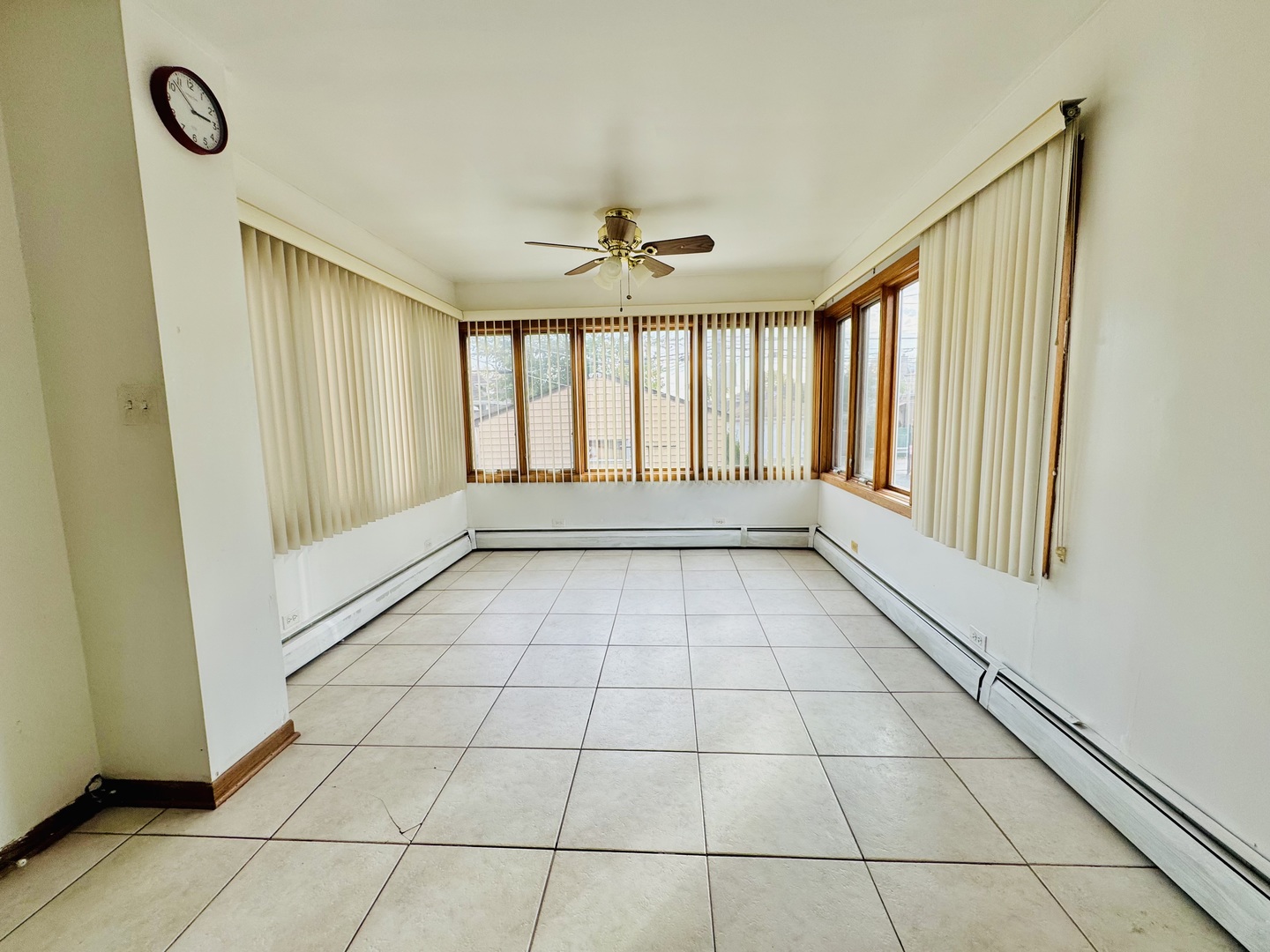 4211 West 63rd Street, Unit 1 Chicago, IL 60629 - Photo 8 of 13 a view of an empty room with a window