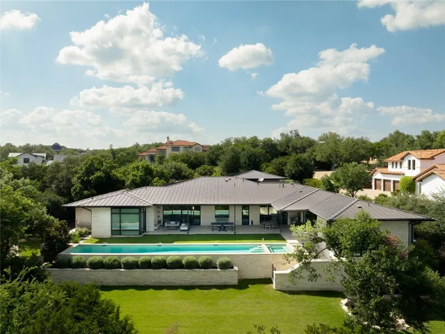 a view of a house with a big yard