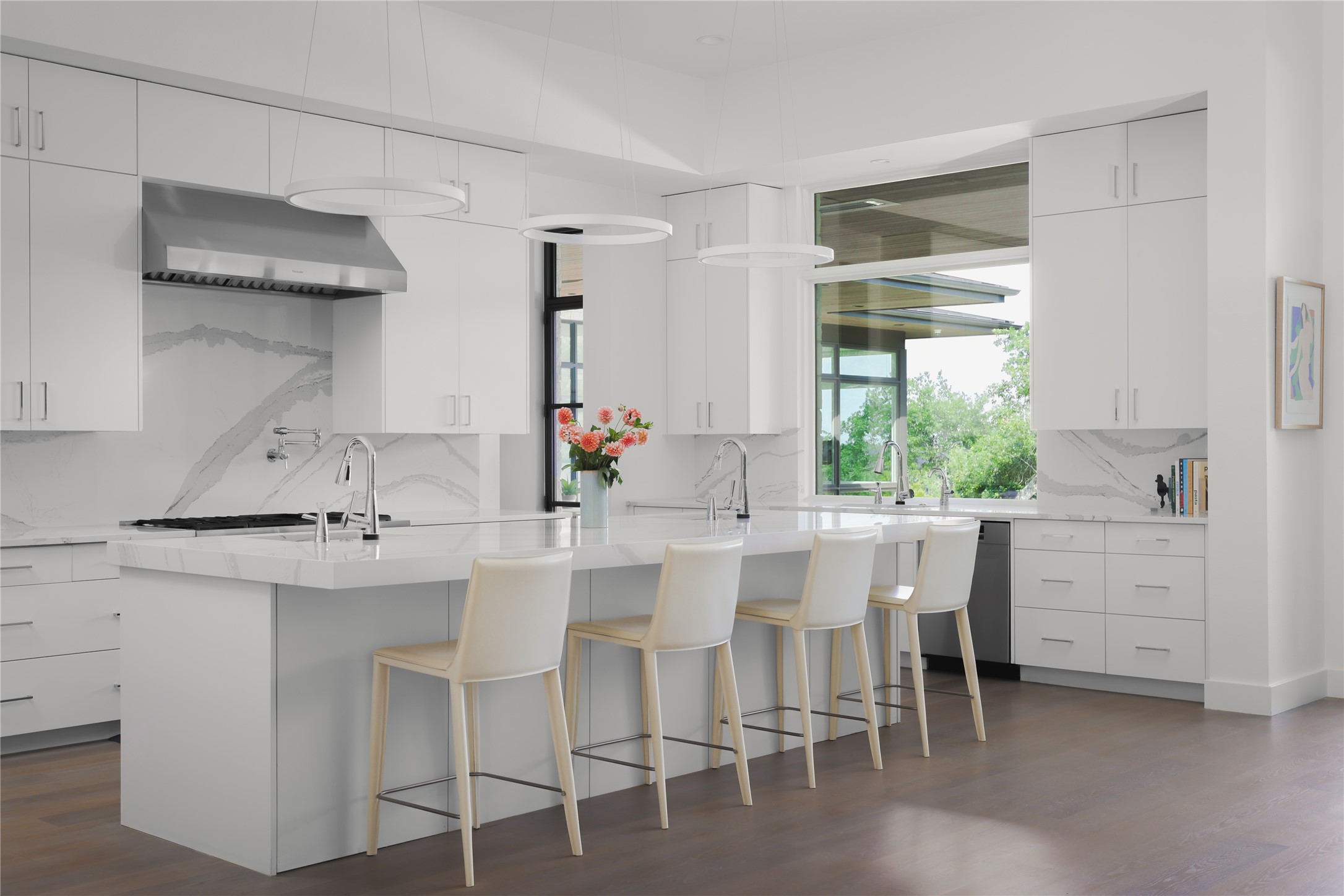 12900 Hacienda Ridge Austin, TX 78738 - Photo 12 of 40 a dining room that has a table and chairs in it